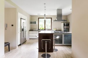 Bright open kitchen with refrigerator 2021 08 26 15 43 49 utc